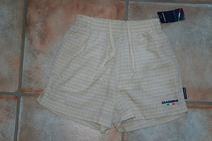 Uued Diadora lühikesed püksid, suurus 8-9 aastat(134cm.)