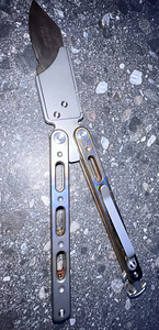 Butterfly knife/titanium handles