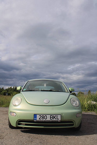 Auto Volkswagen New Beetle (5 foto / 9)