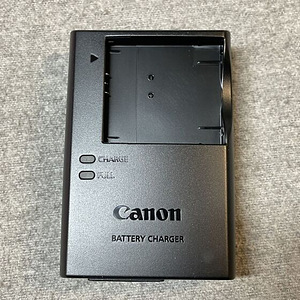 Зарядное устройство Canon + коробка (2 фото из 3)