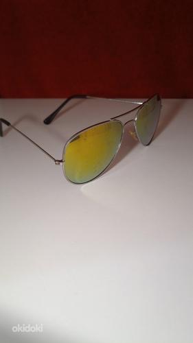 Солнцезащитные очки (фото #4)