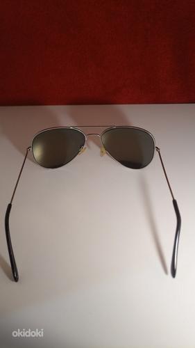 Солнцезащитные очки (фото #6)