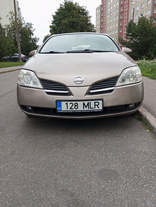 Nissan Primera 2.0 (3 foto / 15)