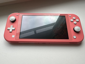 Nintendo Switch Lite + 64Gb SDcard (1 foto / 10)