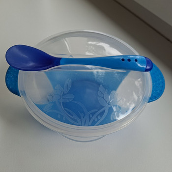 Laste kauss kaane ja lusikaga
