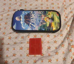 Nintendo Switch Lite + ümbris (2 foto / 6)