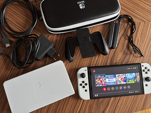 Nintendo Switch OLED, modchipitud(Atmosphere CFW) + 10 mängu (1 foto / 2)