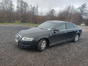 Audi A6C6 quattro 3.0 TDI 2005 (8 foto / 12)