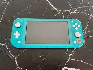 Nintendo switch lite (1 foto / 3)