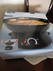 Wok-pann koos elektripliidiga (2 foto / 6)