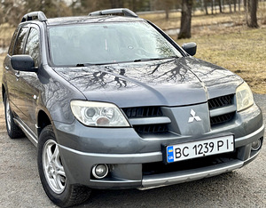Mitsubishi Outlander I (6 foto / 14)