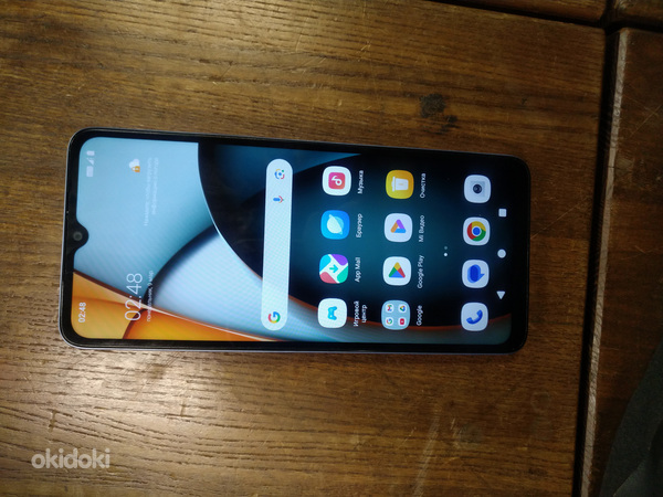 Redmi a3 64 gb + sd card 128 gb + laadija