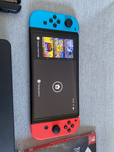 Nintendo Switch OLED 64GB + ümbris + 3 mängu (kassetti) (2 foto / 6)