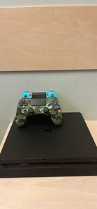 Playstation 4 (1 foto / 2)