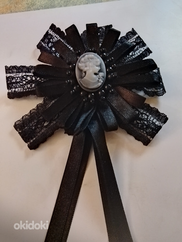 Musta camee pukukoru rusetti