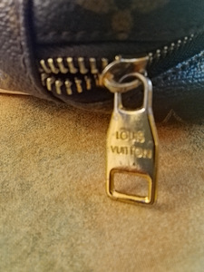 Louis Vuitton nahka laukku (7 valokuva sivusta 8)