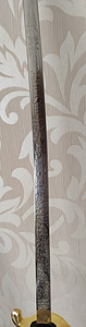 A saber with an engraving (3 foto / 6)
