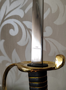 A saber with an engraving (5 foto / 6)