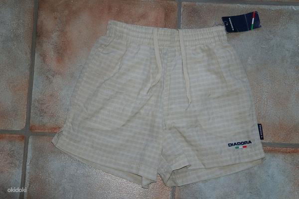 Uued Diadora lühikesed püksid, suurus 8-9 aastat(134cm.) (foto #1)
