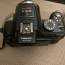 Panasonic Lumix DMC-FZ100 14.1 MP (foto #2)