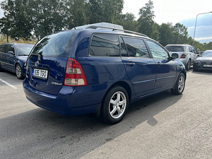 Toyota Corolla (3 foto / 15)