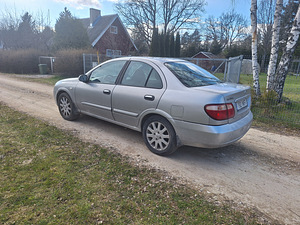Nissan almera (2 foto / 11)