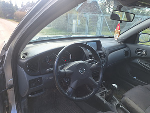 Nissan almera (8 foto / 11)
