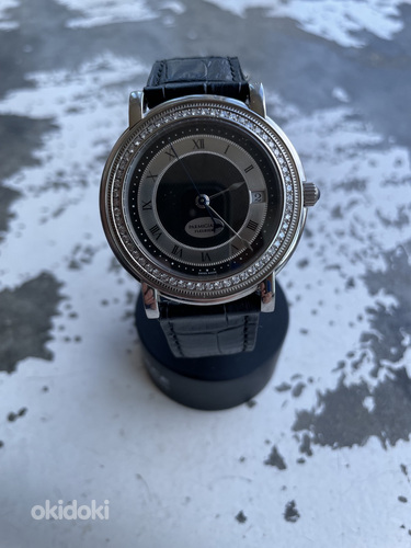 Parmigiani Toric diamond bezel.
