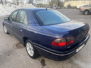 Опель Омега Б (6 фото из 9)