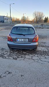 Nissan almera (3 foto / 12)