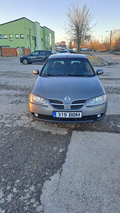 Nissan almera (8 foto / 12)