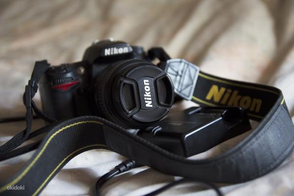 Nikon d7000 + Lens 18-55mm 3.5-5.6 (фото #1)