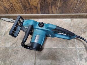 Kettsaag Makita UC3041A (4 foto / 5)
