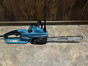 Elektrikettsaag Makita UC4041A (2 foto / 5)