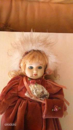 Старинная кукла в зимней одежде (фото #1)