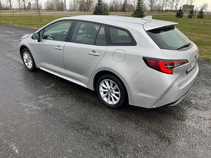 Toyota Corolla гибрид LPG (2 фото из 9)