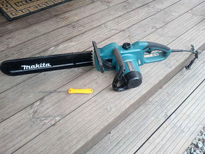 Elektrisaag Makita UC4041A (3 foto / 4)