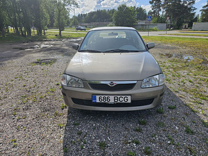 Mazda 323f 1998 aasta (12 foto / 12)