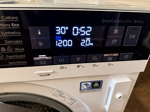 Встраиваемая стирально-сушильная машина Electrolux 10/4 кг 1 (1 фото из 6)