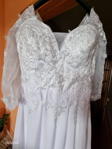 Свадебное новое платье (фото #2)