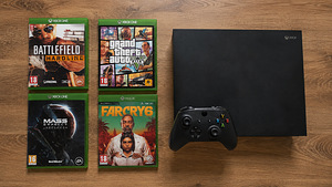 Xbox One X + 4 mängu (1 foto / 1)