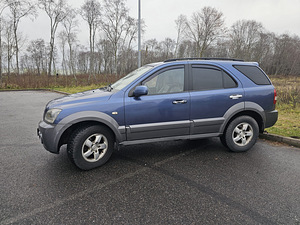 Kia Sorento 2005 (2 foto / 7)