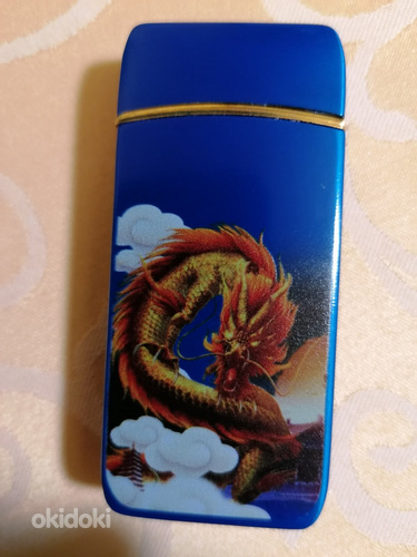Электронная зажигалка с годом дракона. (фото #3)