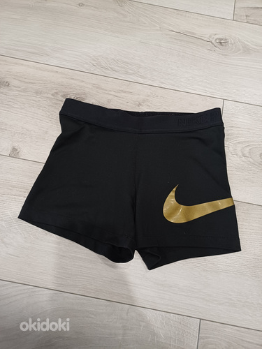 Nike lühikesed püksid tüdrukule suurus 134-146 (foto #1)