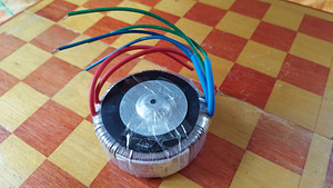 Тороидальный трансформатор 100VA, 2*17V, 2*2.94A, 97*40mm, 1 (2 фото из 2)
