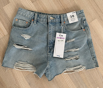 Новые короткие джинсы 38 размера.