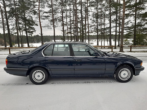 BMW 730i (4 foto / 11)