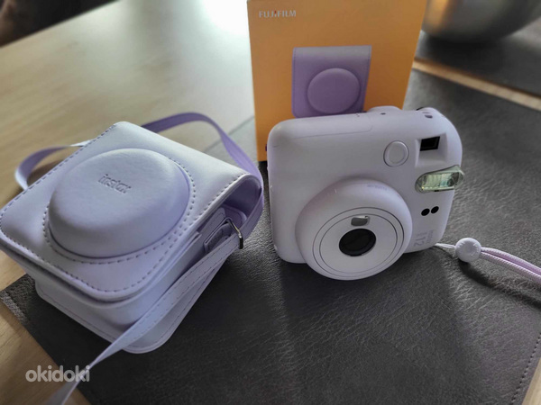 Продается фотоаппарат Fuji INTAX mini 12 + сумка + фотобумаг (фото #2)