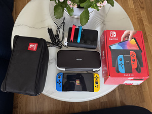 Nintendo Switch OLED + Mig Switch + аксессуары (1 фото из 4)