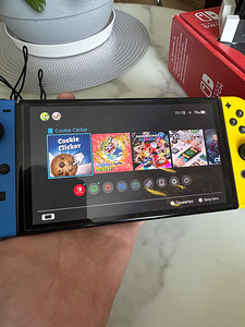 Nintendo Switch OLED + Mig Switch + аксессуары (4 фото из 4)